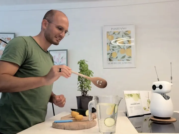 Reachy Mini following a recipe in the kitchen, shared by Christian Kauth