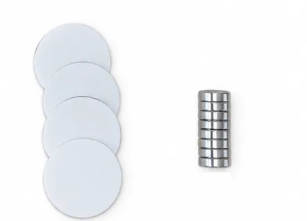 Four blank NFC tags and a stack of magnets